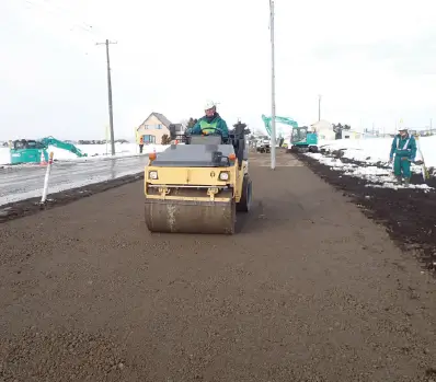 （1）鷹栖東神楽線道路改築工事11工区